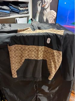 Black and gold coach jacket