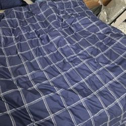 Navy blue and white checkered comforter