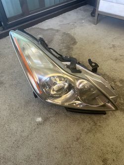 g37 coupe stock passenger headlight