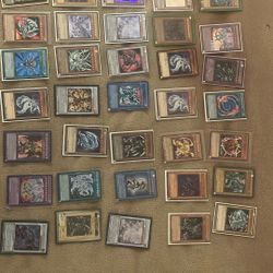 Rare first edition holographic Yu-Gi-Oh cards