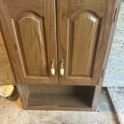 Cabinets above the toilet