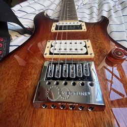 PRS SE with Evertune bridge Seymour Duncan and locking runners