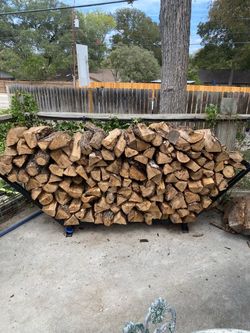 Post oak firewood delivered and stacked.