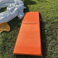 durable camping mattress known for its tough PVC exterior and foam insulation.  Material