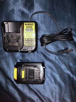 Brand New Never Been Used Dewalt Battery And 12/20 Volt Charger And