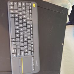 Logitech keyboard with trackpad- out of box- not used.