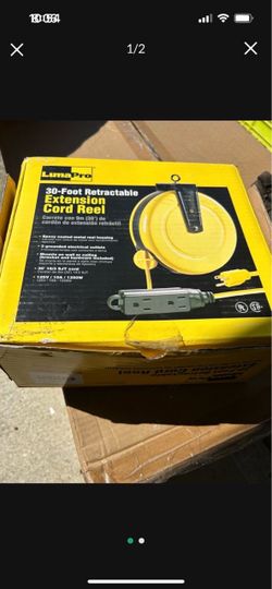 New extension cord reel in box