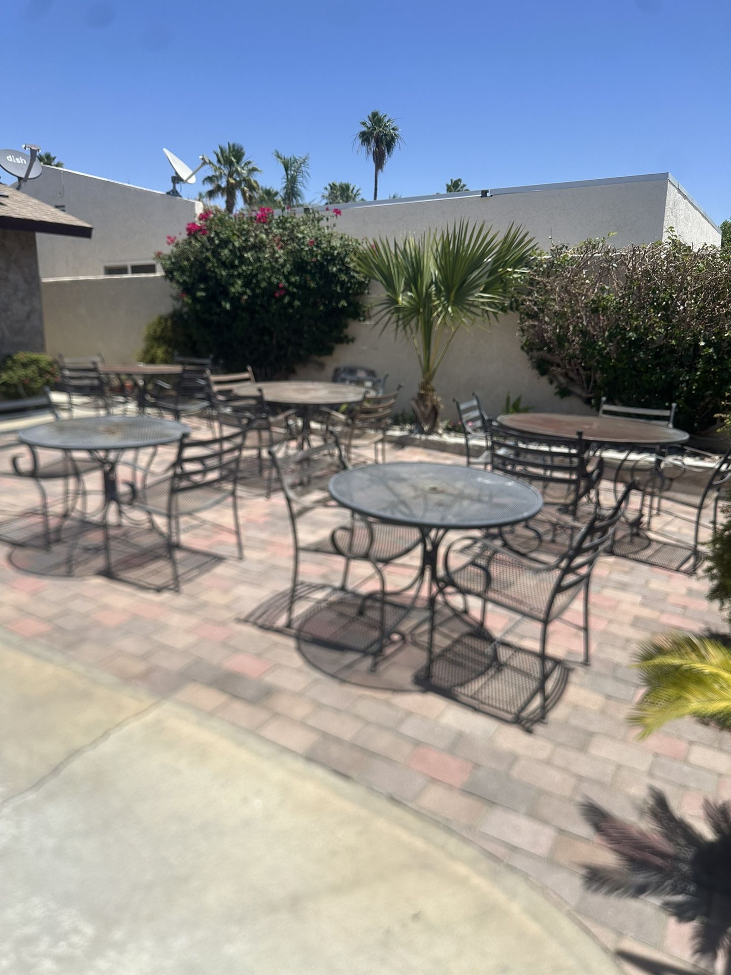 Heavy Wrought Iron Tables (3) 48” (2) 38” & Chairs