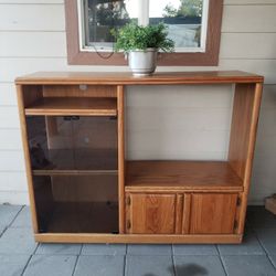 Solid Wood TV Stand With Wheels. 54" L X 16 1/2" W X 43 1/2" H