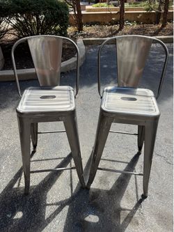 Set of two industrial metal barstools countertop height