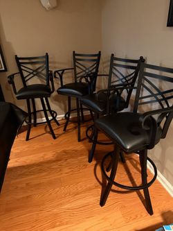 Set 4 Iron and Leather Swivel Bar Stools by Winston Porter Iron and leather swivel 21.5w x16sd x30sh x 45h Like new Smoke free household