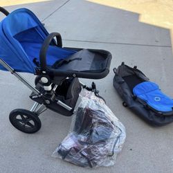 bugaboo cameleon stroller, complete with rainguard and bassinet!
