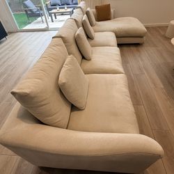 Feathers sectional couch 