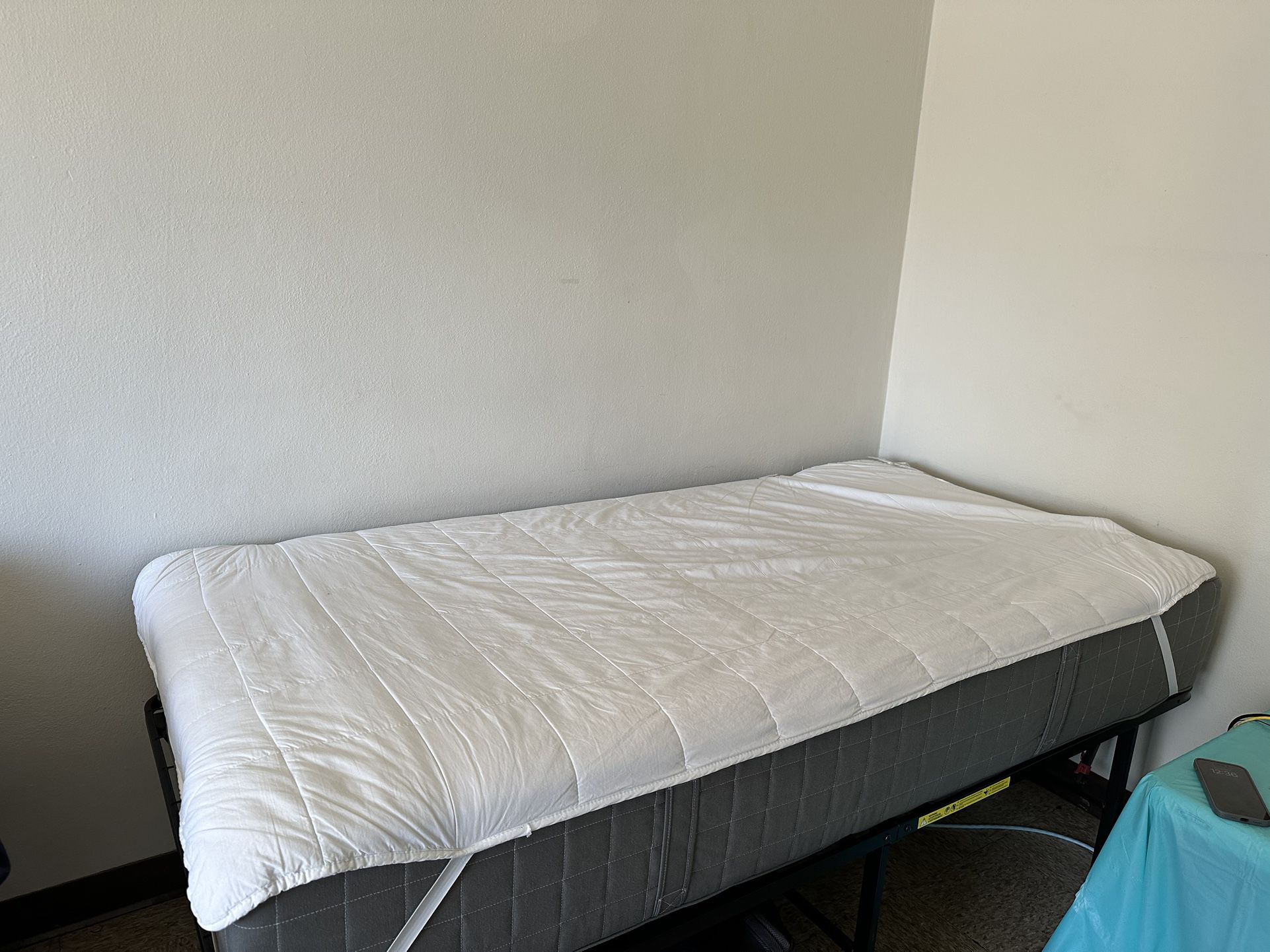 Bed mattress with protector and bed frame 