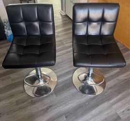 Black leather barstools