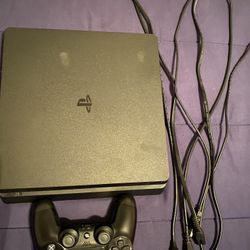 PlayStation 4 Slim 1TB W/Camera And Earbud Mic