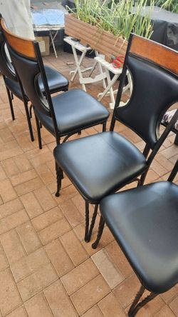 Metal chair with wood and leather seats