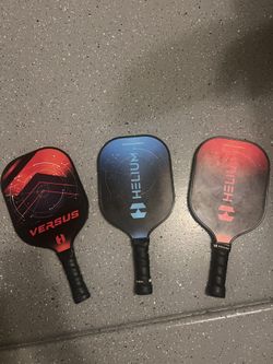 Three Pickle Ball Paddles