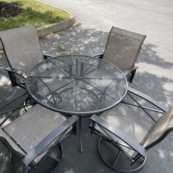42 Inch Round Wrought Iron Table & 4 Swivel Rocker Chairs