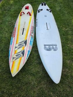 Two windsurfing boards. Could be sailboards. In Palatine.