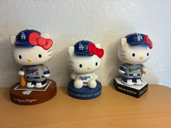 Hello Kitty Dodger bobble heads , looking to trade for Godzilla bobble head