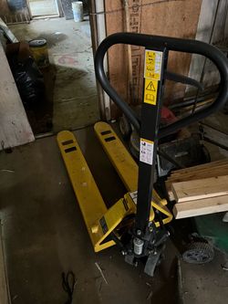 pallet jack (small to fit in doorways)