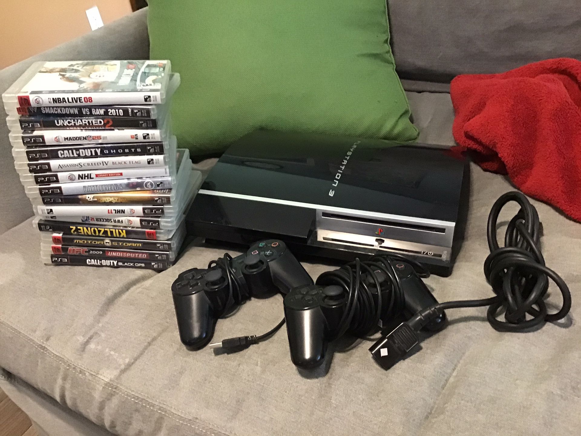 Sony PlayStation 3 w 15 Assorted game disks and all connections complete ...Price Firm Solid
