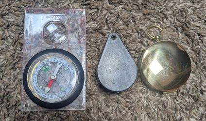 Compass and magnifying glass