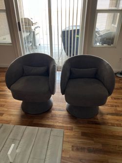 Set of two swivel gray chairs