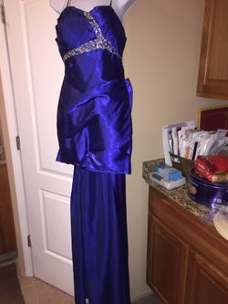 Royal blue all occasions Dress brand new size small.Its a high low style.