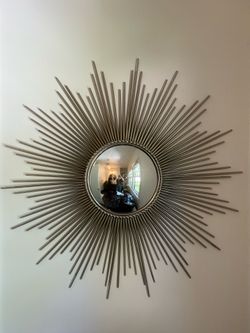 Stainless starburst mirror