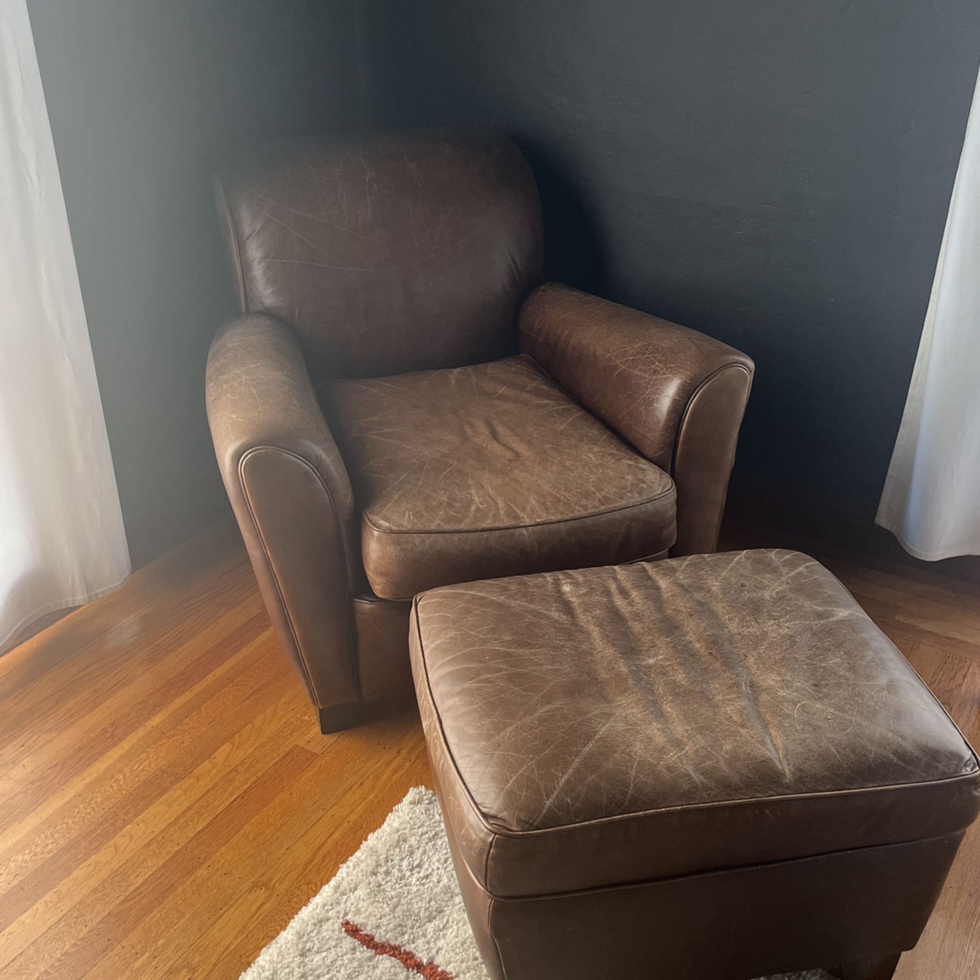 Leather Arm Chair And Ottoman 