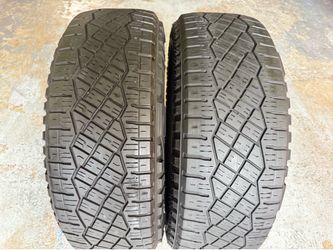 Pair of All-Terrain Tires 285/65/20 Goodyear Wrangler Territory EV with 60-70% Left Tesla