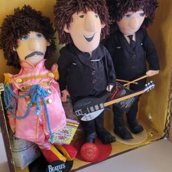 Beatles Dolls in Display Case with lighting