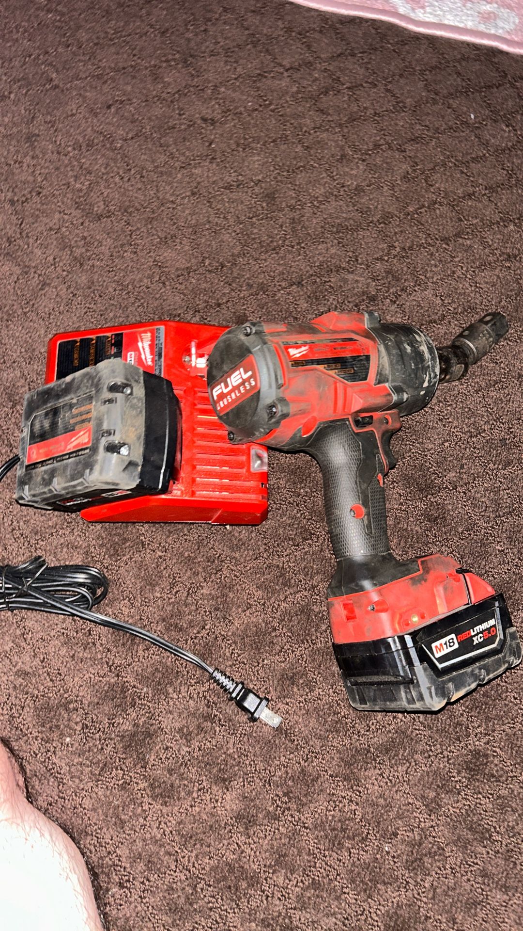 Impact drill with battery and charger