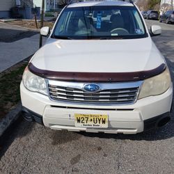 2010 Subaru Forester.   140,407 Miles