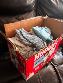 Box of newborn boy clothes