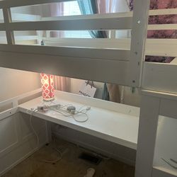 Twin size loft bed with desk and three drawer dresser and ladder