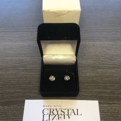 one pair sterling silver stud earings with Swarovski crystal elements in a velvet display case & gift box