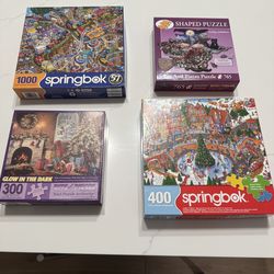 Four Puzzles -pre-owned good condition