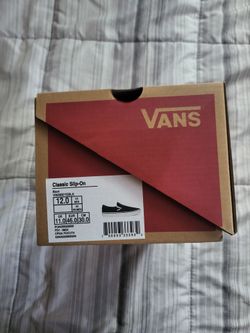Black van slip on size 12