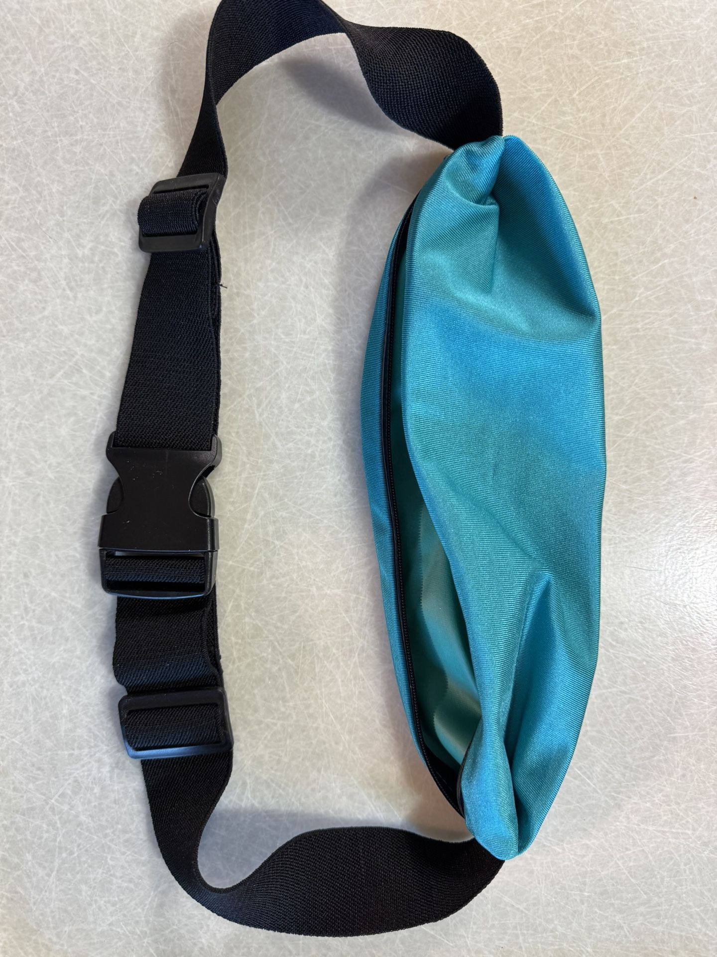 CA. FANNY WAIST PACK. ONE POUCH. EXPANDABLE. NOT USED.
