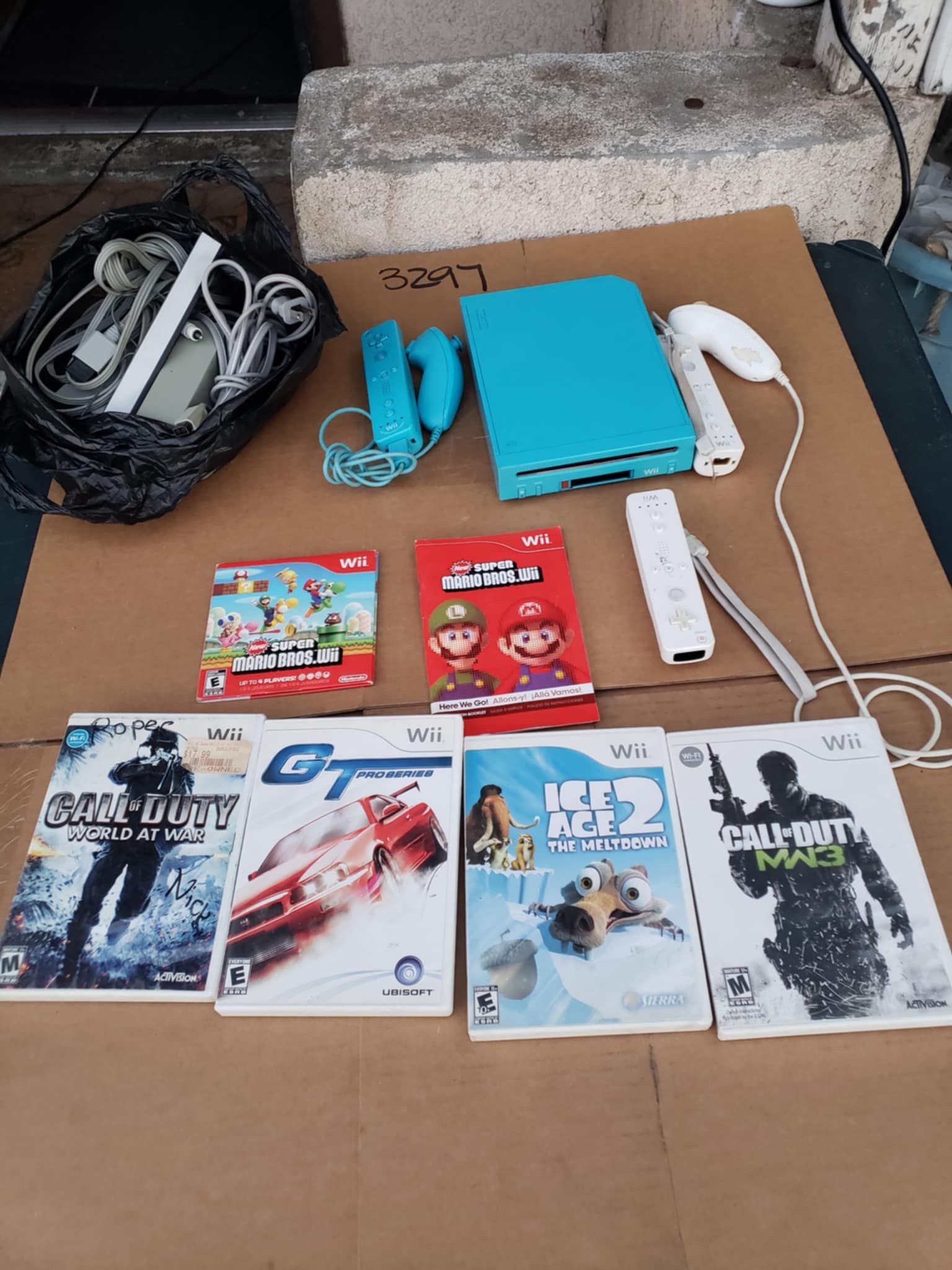 Sonic Blue Edition Nintendo will With All Sensors & Cables. 3 Pair of controllers. 5 Great Games for $200! Free Delivery. Im willing trade