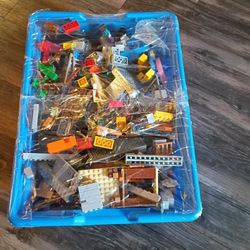 Bin Full Of Legos With Figures 