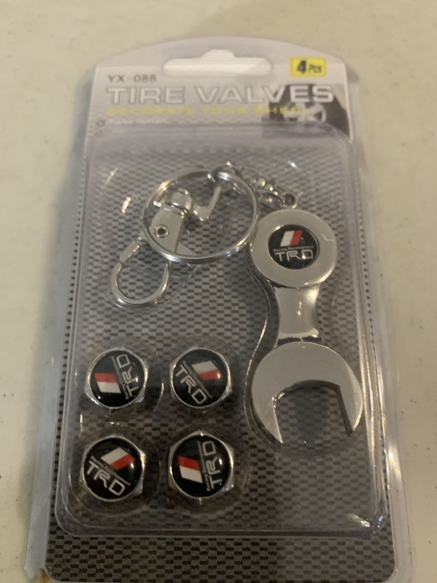 Toyota racing development tire valve with keychain wrench