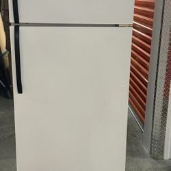 Frigidaire Refrigerator.  Top freezer bottom refrigerator