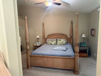 Four poster bed with matching armoire and side tables