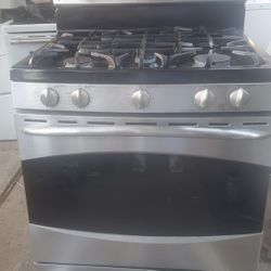 GE STAINLESS STEEL GAS STOVE BURNERS AND OVEN WORKING PERFECT 