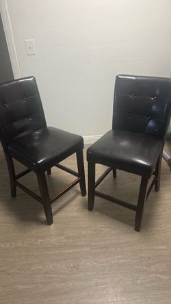 2 black chairs