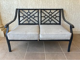 Patio loveseat with two cushions